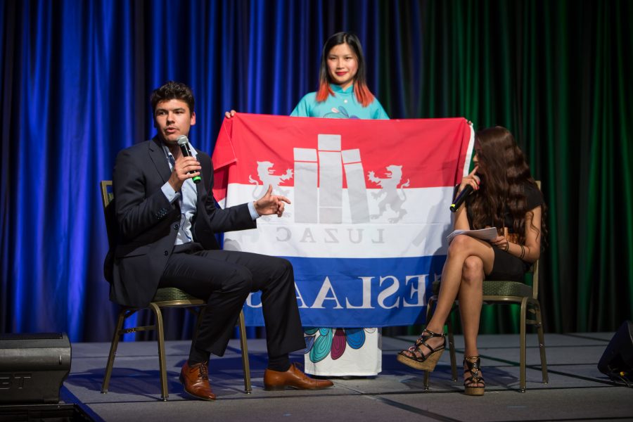 A representative from The Nederlands is interviewed during the Council of International Student Affairs organized fashion show. (Davis Bonner | Collegian)