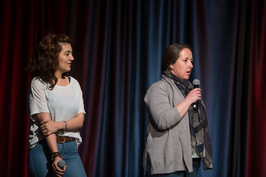 Representatives from Turkey show a video highlighting their country during the Council of International Student Affairs organized fashion show. (Davis Bonner | Collegian)