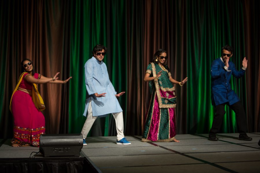 Representatives from India perform a cultural dance during the Council of International Student Affairs organized fashion show. (Davis Bonner | Collegian)