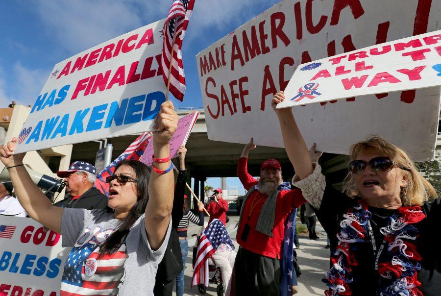 Trump supporters gather at the Tom Bradley International Terminal at LAX in Los Angeles on Saturday, Feb. 4, 2017. (Luis Sinco/Los Angeles Times/TNS)