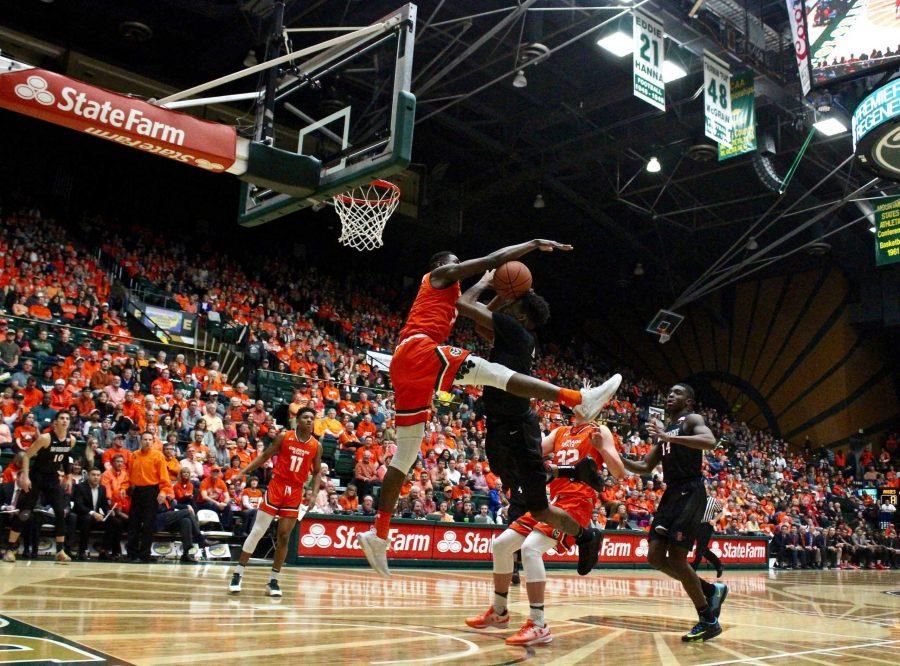 Emmanuel Omogbo blocks a shot at the San Diego State Basketball game on February 25, 2017.  The Rams won the game 56-55. (Matt Begeman | Collegian)