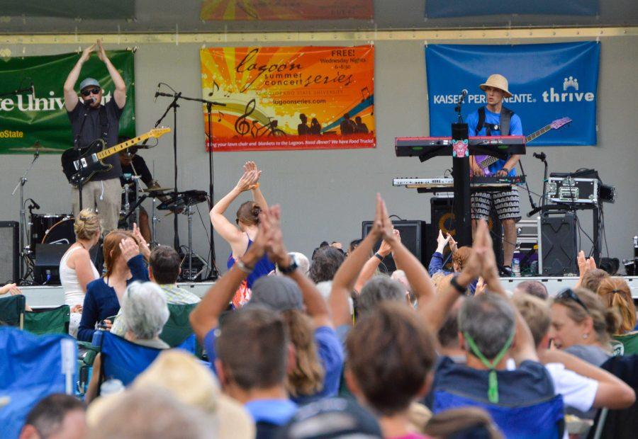 The crowd claps along with Tatanka's performance at the Lagoon Summer Concert Series Wednesday evening. Photo by Olive Ancell | Collegian