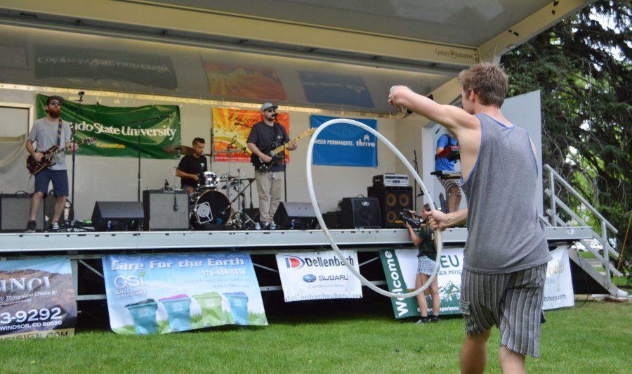 A crowd member hula hoops during the performance of Tatanka at the Lagoon Summer Concert Series.Photo by Olive Ancell | Collegian