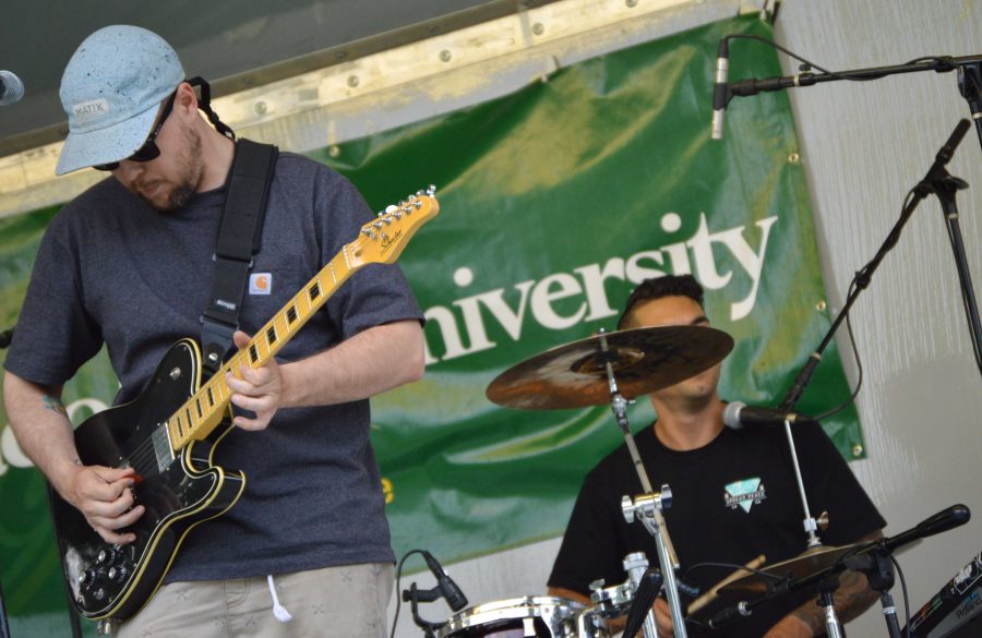 Ian Gastl and Mike Caine from Tatanka perform at the Lagoon Summer Concert Series Wednesday night. Photo by Olive Ancell | Collegian