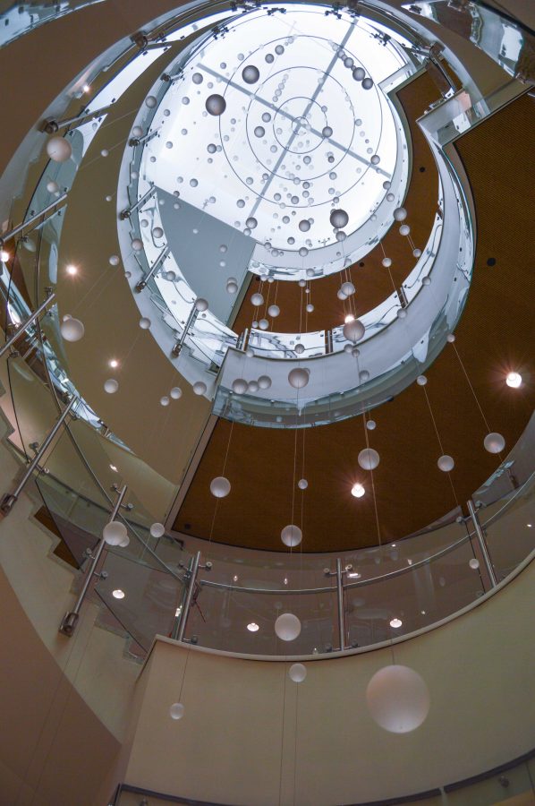 The New CSU Health and Medical center features a spiral staircase with a hanging art installation to "encourage people to take the stairs," explained Kate Hagdorn, associate director of communications. Photo by Olive Ancell | Collegian