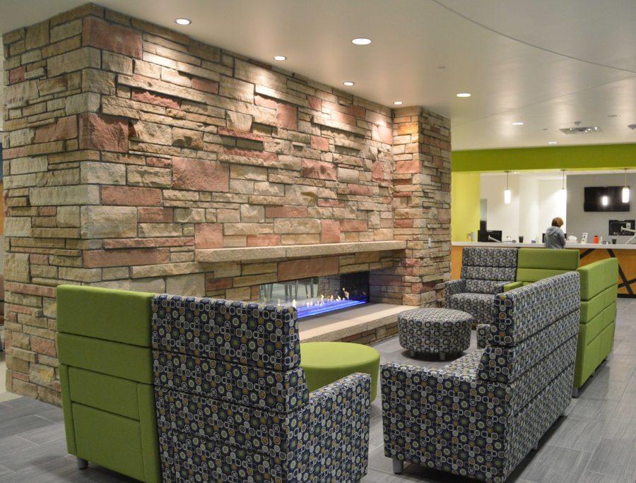 The new CSU Health and Medical Center features cozy waiting rooms throughout the four story building, featuring fireplaces, sitting areas, and windows for an abundance of natural light. Photo by Olive Ancell | Collegian