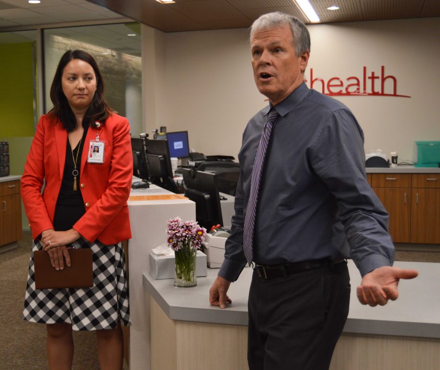 Grace Taylor with UCHealth and Dr. James Sprowell, CEO of Associates in Family Medicine, discuss the UC Health and Associates in Family Medicine facility located inside the new CSU Health Center. Photo by Olive Ancell | Collegian