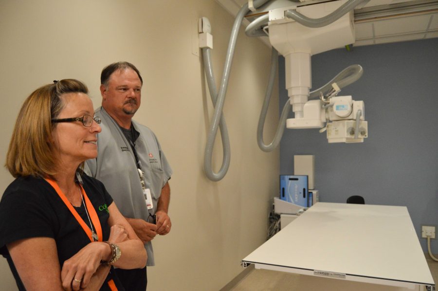 Radiology technicians discuss how the new radiology facility will be used through medical partners of CSU at the new CSU Health and Medical Center. Photo by Olive Ancell | Collegian
