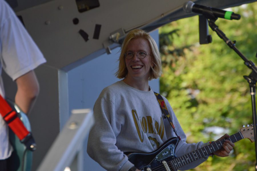 Jakob Mueller from Slow Caves was all smiles as he performed in the bands hometown at the Lagoon Summer Concert Series. Photo by Olive Ancell | Collegian