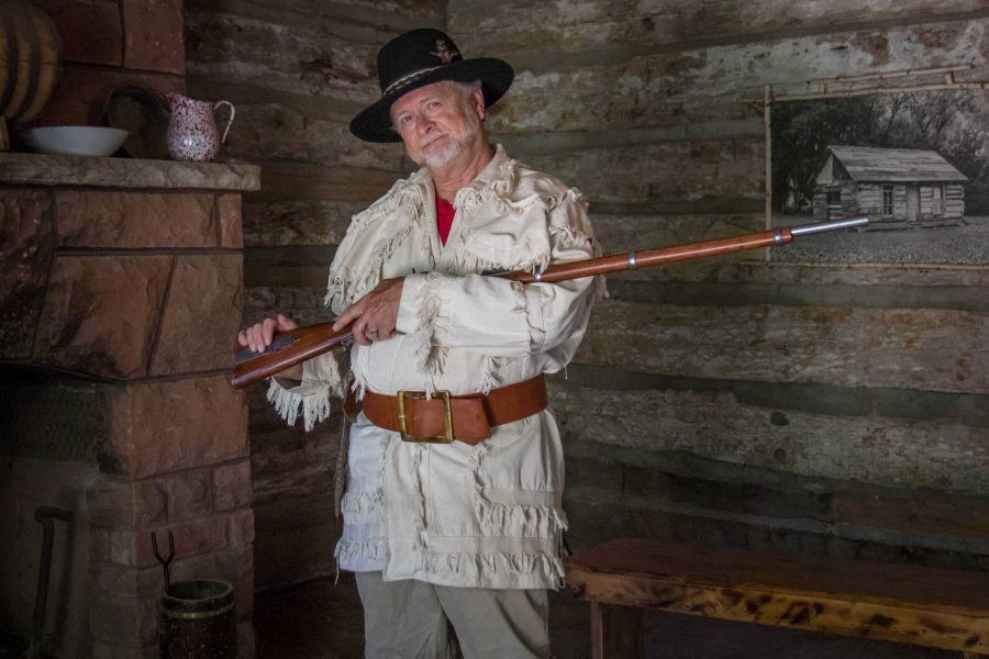 Jeff Stone, dressed as Antoine Janis, tells Janis's story as the citizens of Fort Collins view one of the first buildings in Fort Collins (Julia Trowbridge | Collegian)