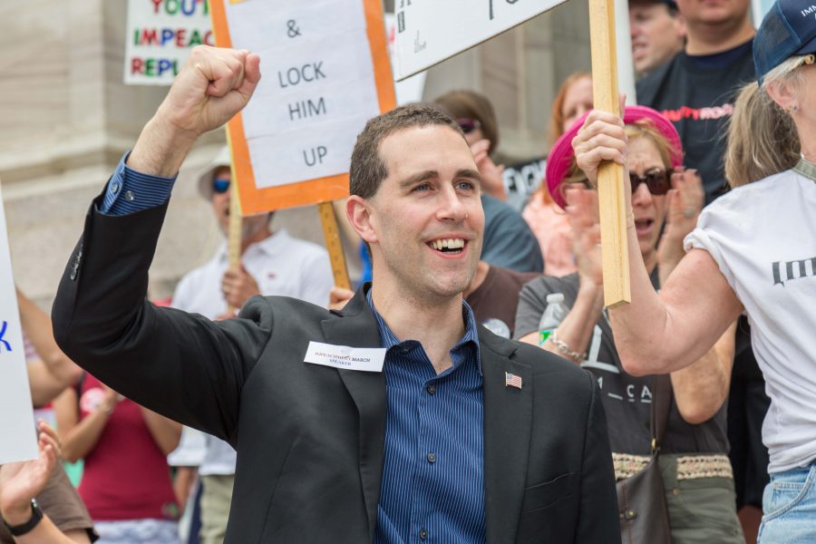 Alan Kennedy-Shaffer, a future state senetor candidate, joins the protesters for their Trump Impeachment March around the Colorado State Capitol. (Davis Bonner | Collegian)