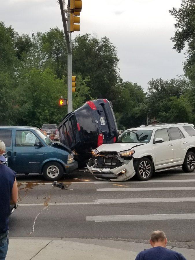 Fort Collins Police Services responded to a three-car collision at the intersection of Mulberry and Shields on Tuesday evening. (Photo courtesy of Kyle Tong.)