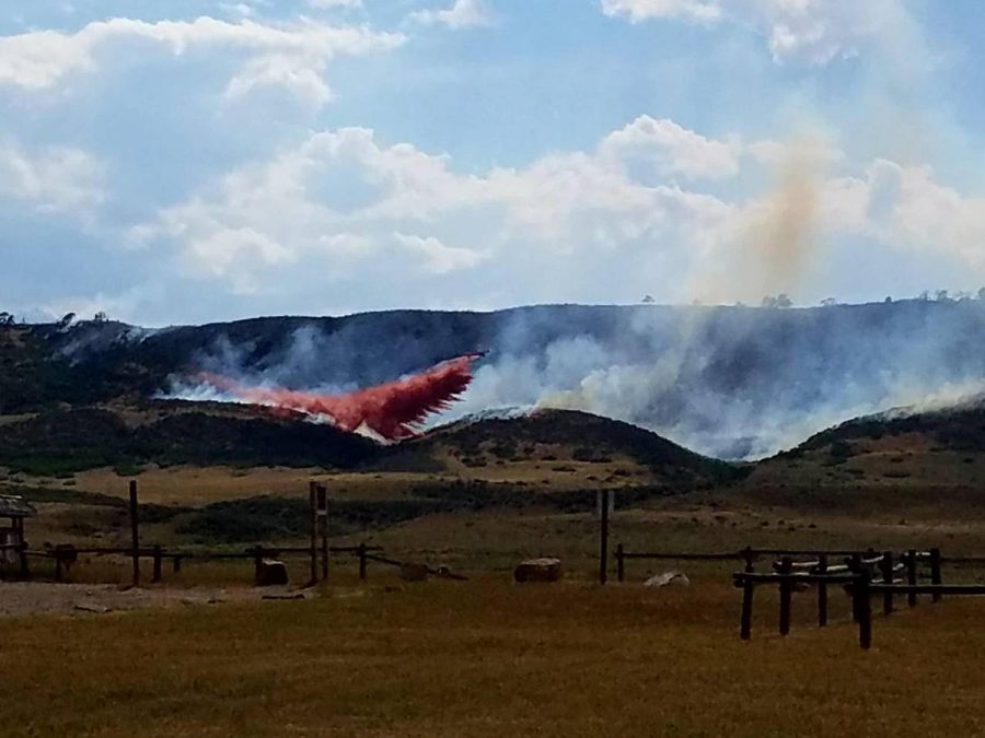 A single engine air tanker flies over the fire in Spring Glade on July 22. (Photo courtesy of Larimer Sheriffs official Twitter)