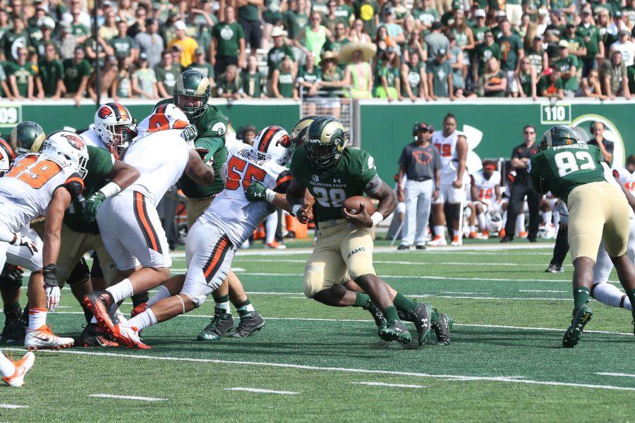 Running Back Rashaad Boddie runs into Beaver territory on August 26, 2017. The Rams in their inaugural game are taking on the OSU Beavers. (Elliott Jerge | Collegian)