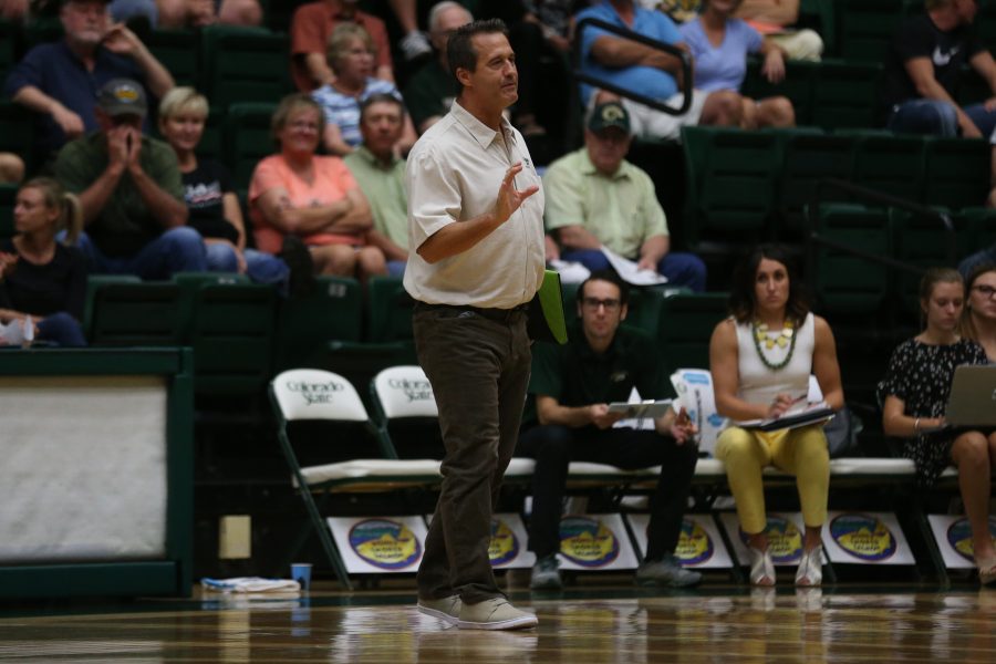 Colorado State Volleyball Head Coach Tom Hilbert talks to his team during a break in play on August 29, 2017 against the University of Northern Colorado. The Rams defeated the Bears in three sets. (Elliott Jerge | Collegian)