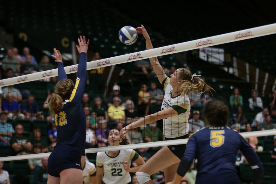 Colorado State sophomore Kristie Hillyer sends a ball over the net against the University of Northern Colorado on August 27, 2017. The Rams defeated the Bears in three sets.  (Elliott Jerge | Collegian)