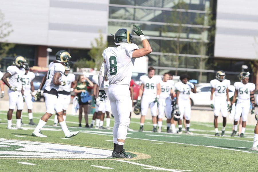Senior Safety Jake Schlager (8) calls out a defense Head Coach Mike Bobo shows some intensity and emotion during one of the CSU Football drills on August 1st at the new CSU stadium practice field. (Javon Harris | Collegian)