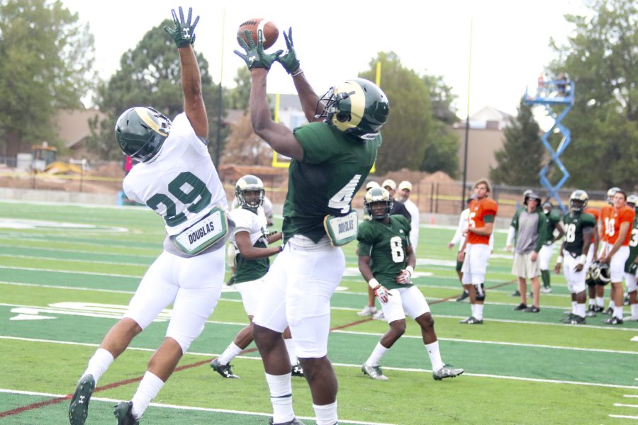 Senior Wideout Michael Gallup (4) makes a spectacular catch at the goaline during one of the CSU Football drills on August 1st at the new CSU stadium practice field. (Javon Harris | Collegian)