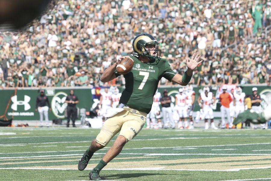 Senior Quarterback Nick Stevens (7) scrambles out of the pocket looking downfield for an open receiver during the second half of the 58-27 victory over Oregon State on Aug.
 26, 2017. (Javon Harris | Collegian)