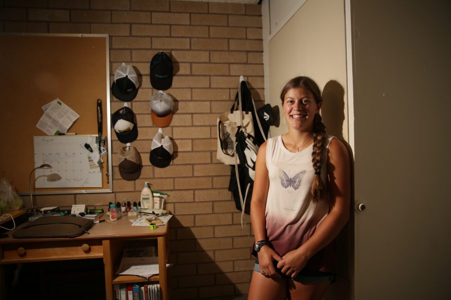 Megan Johnston, a freshman at Colorado State University, poses for a portrait in her dorm room at Newsom hall on Friday afternoon. Forrest Czarnecki | The Collegian