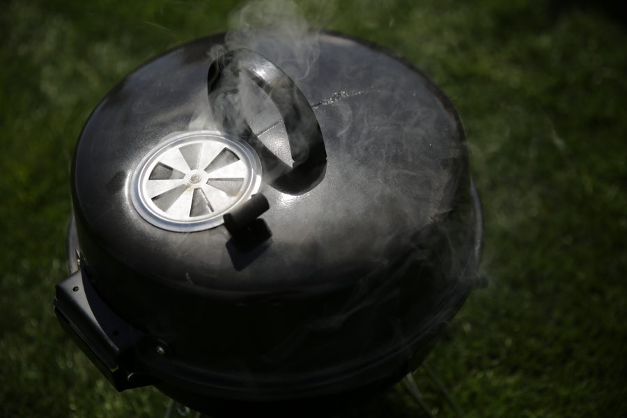 Football fans grill out on the Intramural sports fields at Colorado State University before the start of the first football game of the 2017 season on Saturday, August 26th. Forrest Czarnecki | The Collegian