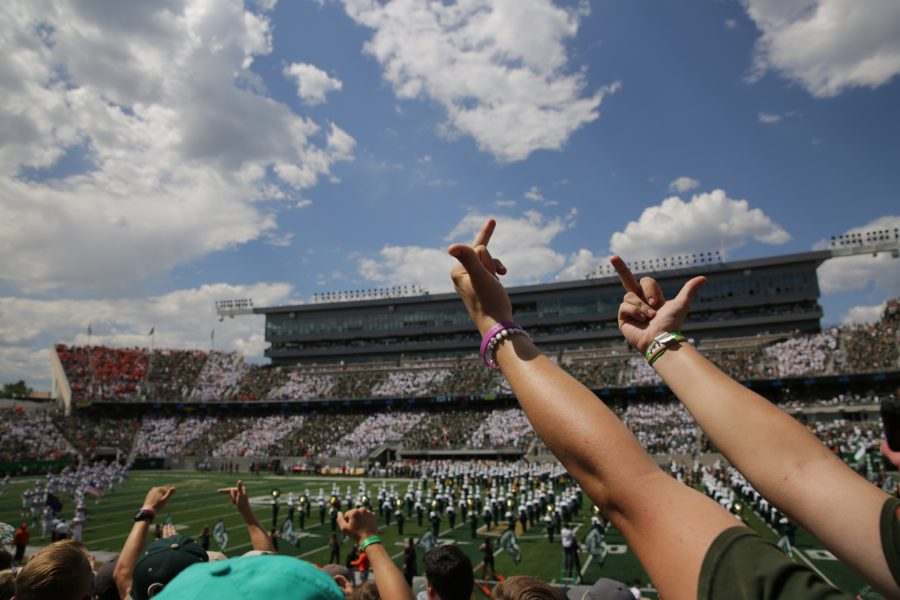 A Colorado State University fan makes hand gestures towards the Oregon State football team as the Beavers take to the field prior to the start of CSU's first football game of the season on Saturday, August 26th. Forrest Czarnecki | The Collegian