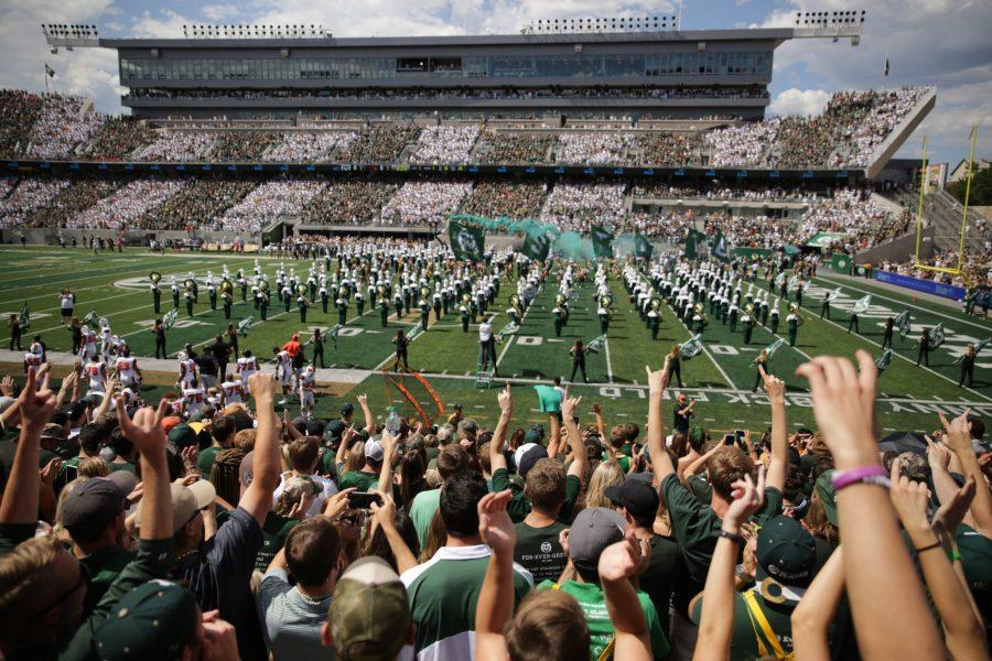 Colorado State University fans cheer as the Rams take to the field prior to the start of CSU's first football game of the season on Saturday, August 26th. Forrest Czarnecki | The Collegian