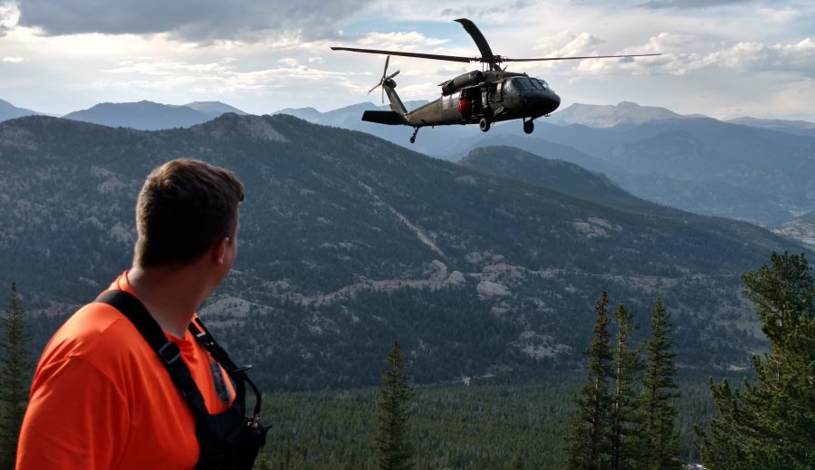 Blackhawk helicopter airlifts injured climber from Rocky Mountain National Park (Photo courtesy of LCSO). 