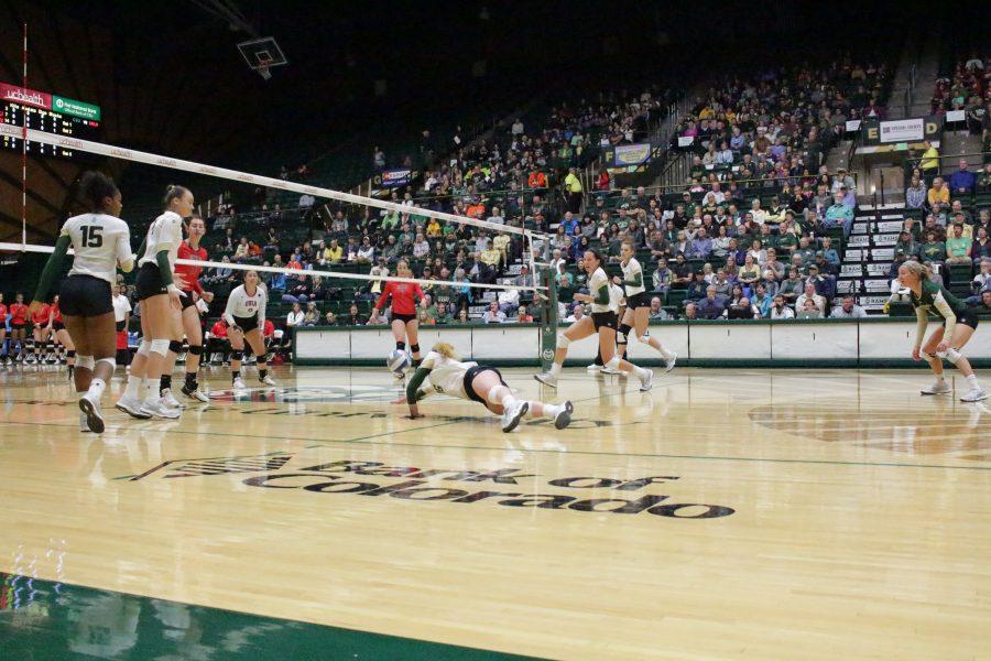 Freshman Maddi Foutz (16) dives for the ball at the CSU vs. UNLV volleyball match in Moby Arena on Sept 23. (Jenny Lee | Collegian)