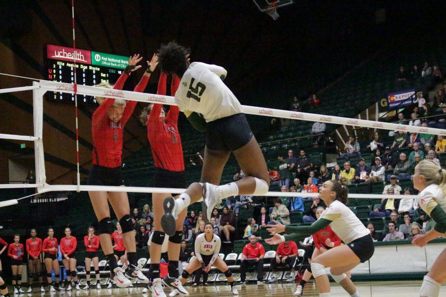 Freshman Breanna Runnels (15) spikes the ball into the opposing teams court at the CSU vs. UNLV volleyball match in Moby Arena on Sept 23. (Jenny Lee | Collegian)