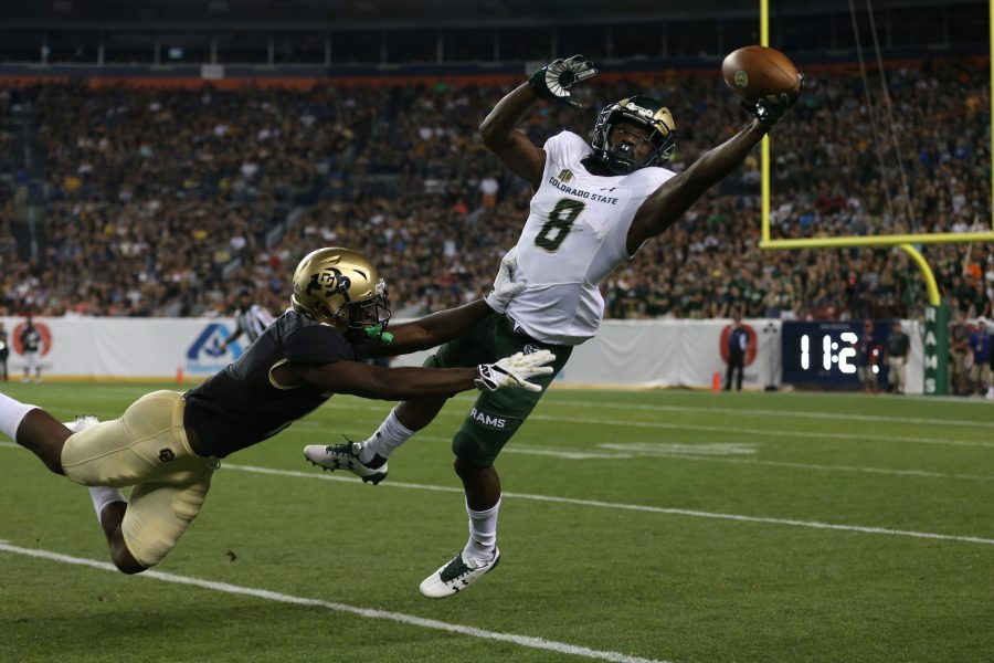 Detrich Clark (8) goes up for a catch against a Colorado defensive back during the fourth quarter of the Rocky Mountain Showdown. (Elliott Jerge | Collegian)