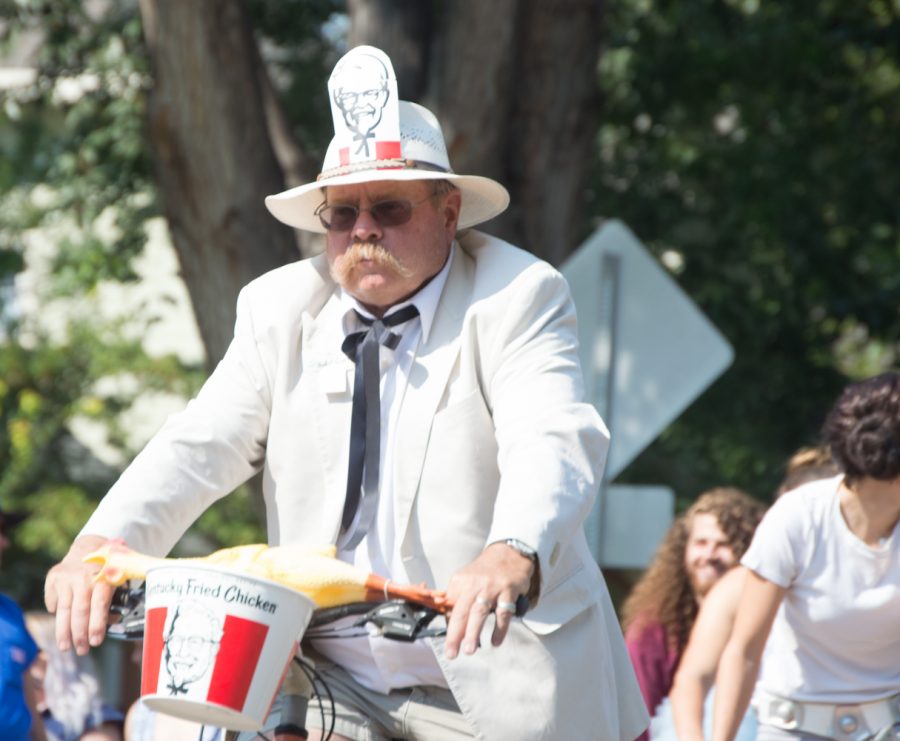 Colonel Sanders rode in the Tour de Fat parade Saturday afternoon, accompanied by his rubber chicken and bucket of fried goodness. Photo by Olive Ancell | Collegian