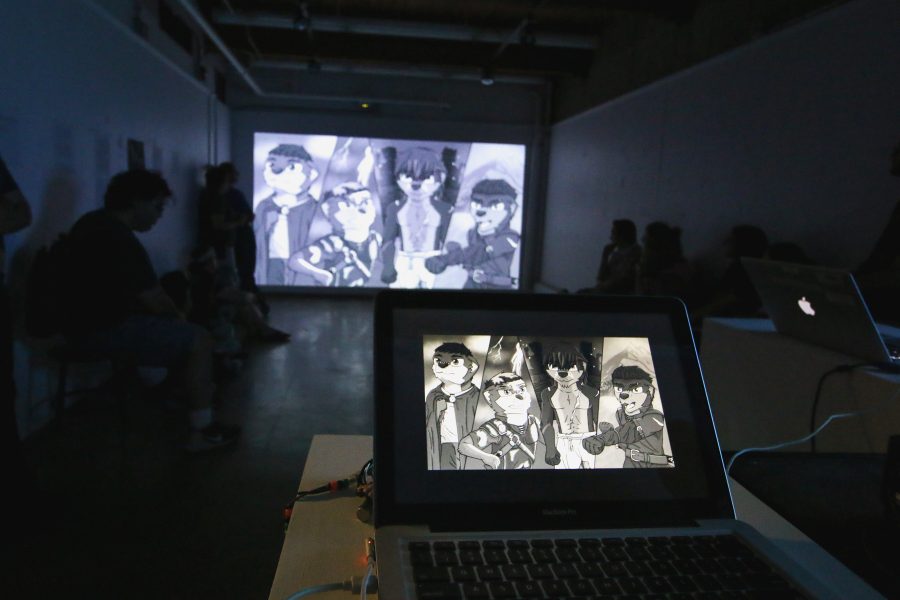 Colorado State University student artwork is projected off of a computer during a show in the Visual Arts building on September 5 (Jack Starkebaum | Collegian).