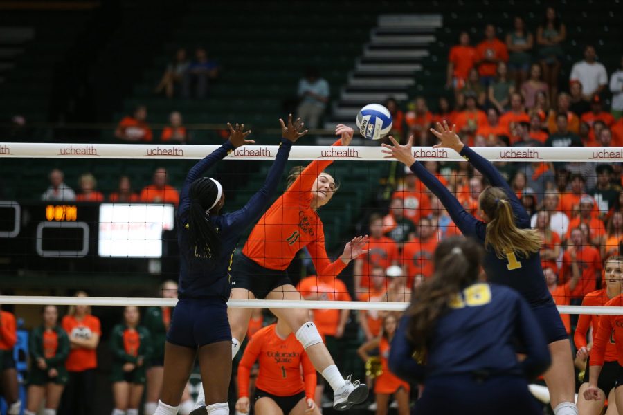 Sophomore Paulina Hougaard-Jensen sends a ball over the net during the third set against the University of Michigan on Sept 8. The Rams defeated the Wolverines in three sets. (Elliott Jerge | Collegian)