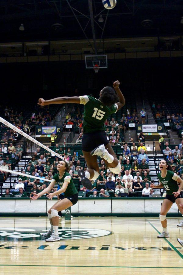 After receiving a set from sophomore Katie Oleksak, sophomore Breana Runnels jumps in the air to spike the volleyball during the Sunday September 10, 2017 volleyball game versus Idaho State. (Matt Begeman | Collegian)