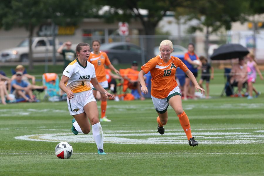 Midfielder Beth Plentl chases a lose ball down during the first quarter of action against North Dakota State University. The Rams defeated the Bison 5-1 on Sept 10. (Elliott Jerge | Collegian)
