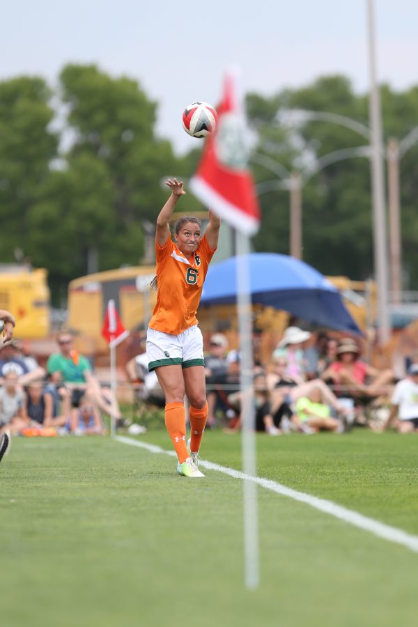 Defender Lexi Swanson throws a ball into play during the first half of action against North Dakota State University on Sept 10. The Rams defeated the Bison 5-1. (Elliott Jerge | Collegian)