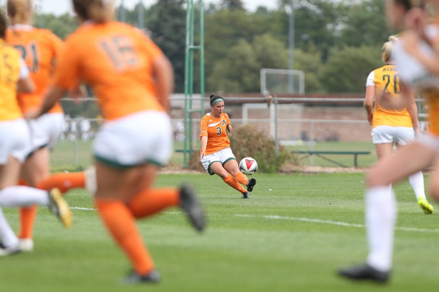 Defender Makenzi Taylor sends a ball into North Dakota State University Territory on Sept 10. The Rams defeated the Bison 5-1. (Elliott Jerge | Collegian)