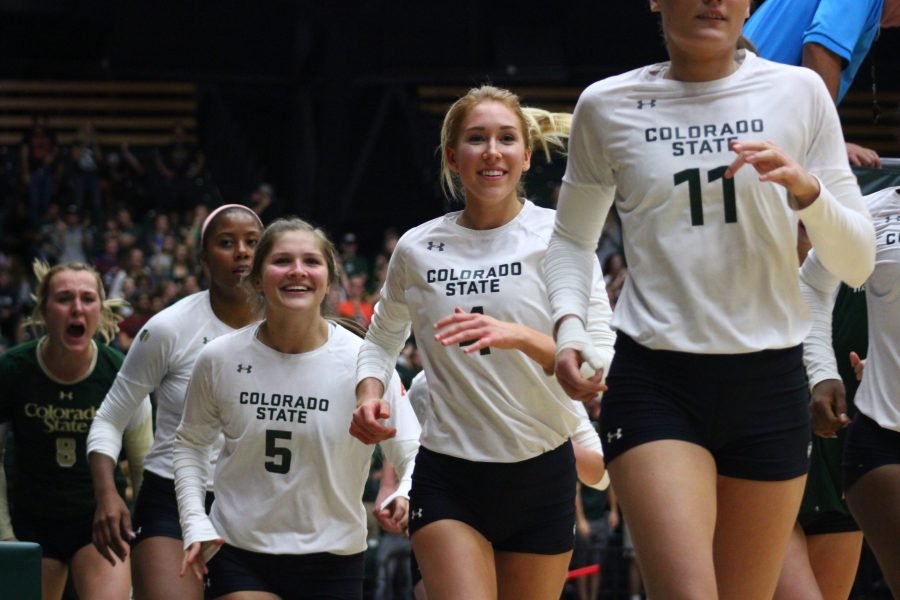The Volleyball team runs off the court after winning the first two sets during the game against CU Boulder on September 16, 2017. (Matt Begeman | Collegian)