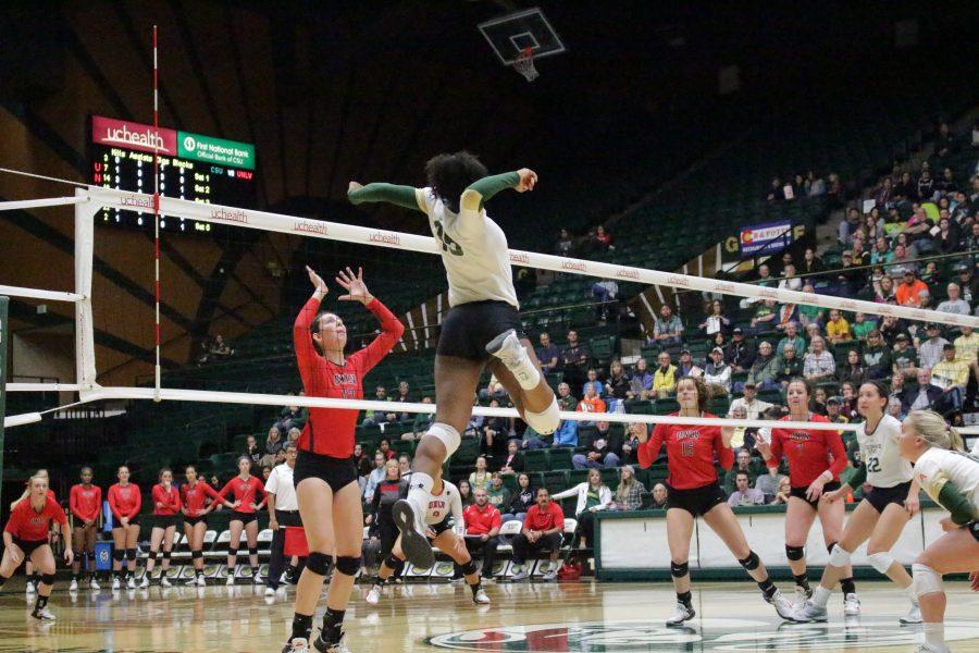 Freshman Breanna Runnels (15) spikes the ball into the opposing teams court at the CSU vs. UNLV volleyball match in Moby Arena on Sept 23. (Jenny Lee | Collegian)