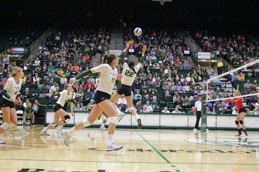 Sophomore, Katie Oleksak (22), sets the ball at the CSU vs. UNLV volleyball match in Moby Arena on Sept 23. (Jenny Lee | Collegian)
