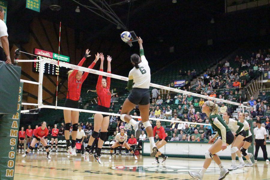 Senior Jasmine Hanna (6) spikes the volleyball into the opposing teams court at the CSU vs. UNLV volleyball match in Moby Arena on Sept 23. (Jenny Lee | Collegian)