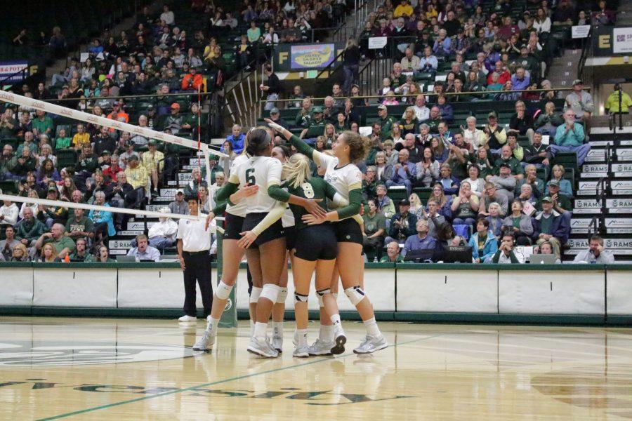 The team gives each other congratulatory pats after a point gained for CSU at the CSU vs. UNLV volleyball match in Moby Arena on Sept 23. (Jenny Lee | Collegian)