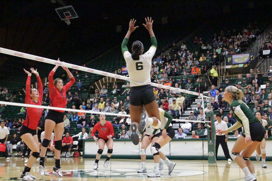 Senior, Jasmine Hanna (6), sets the volleyball into the opposing teams court at the CSU vs. UNLV volleyball match in Moby Arena on Sept 23. (Jenny Lee | Collegian)