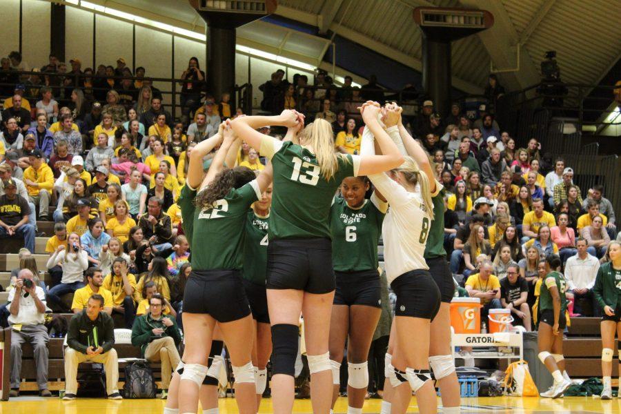 The CSU volleyball team huddles around with high spirit during the game. CSU swept UW in three sets on Sept 26. (Joshua Contreras | Collegian)