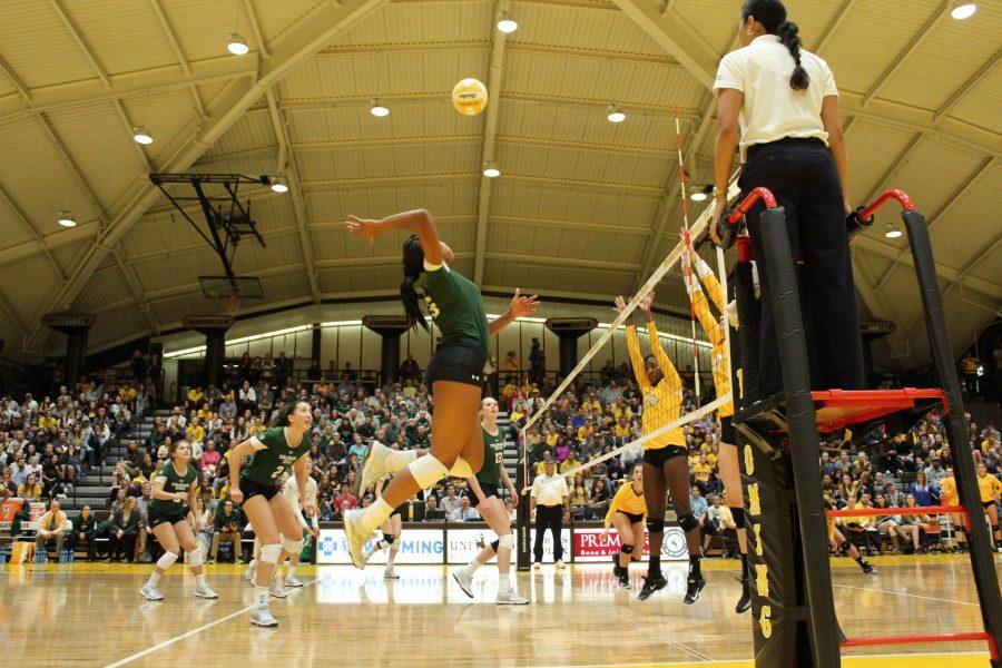 Senior, Jasmine Hanna goes in for a spike against UW volleyball during the CSU vs. UW volleyball game. CSU swept UW three sets to none on Sept 26. (Joshua Contreras | Collegian).