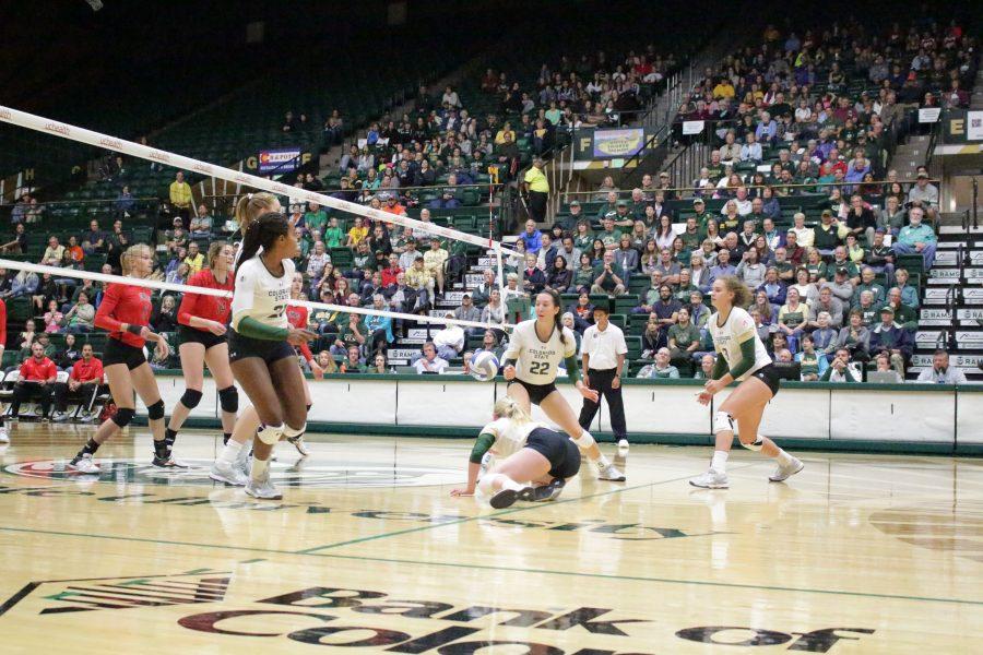 Freshman, Maddi Foutz (16), dives for the ball at the CSU vs. UNLV volleyball match in Moby Arena on Sept 23. (Jenny Lee | Collegian)