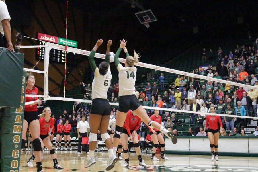 Seniors, Jasmine Hanna (6) and Alexandra Poletto (14), jump up to block the ball at the CSU vs. UNLV volleyball match in Moby Arena on Sept 23. (Jenny Lee | Collegian)