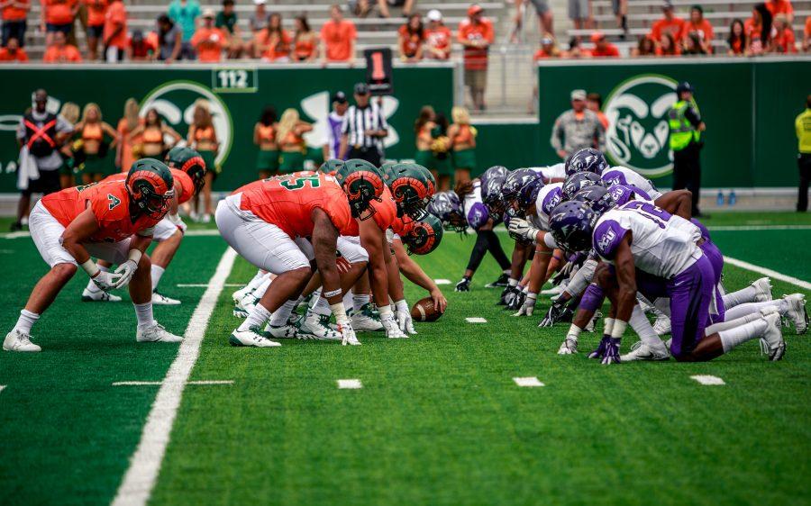 CSU and ACU line up for the snap on Saturday. CSU won with a final score of 38-10. (Davis Bonner | Collegian)