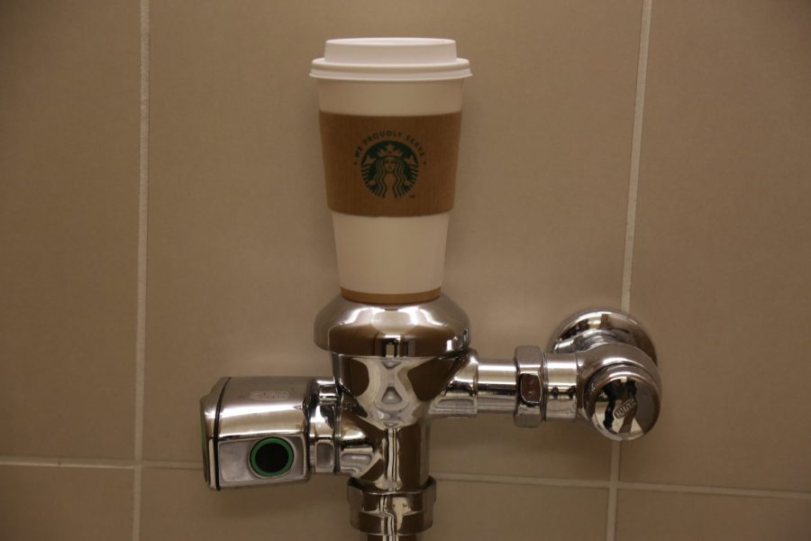 Some CSU students struggle with where to put their coffee cup when using the restroom due to an obvious lack of cup holders. (Davis Bonner | Collegian)